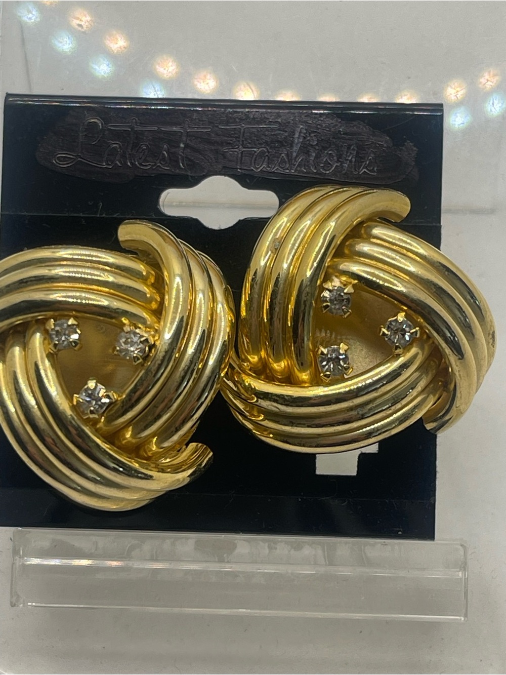 Gold-Tone Knotted Hoop clip Earrings with Crystal Detail